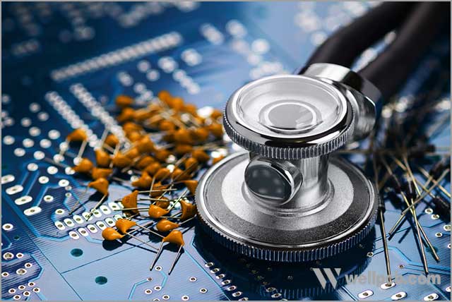 Medical stethoscope and electronic components on the blue printed circuit board.jpg