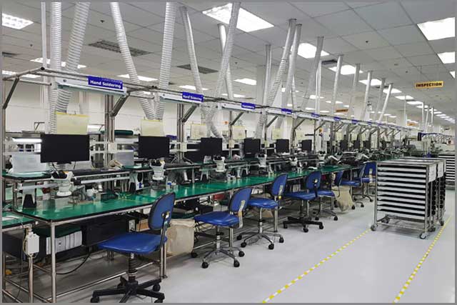 a clean production line of a factory meant for designing electronic circuit.jpg