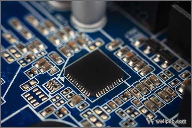 a chip in a computer with many electrical elements.jpg