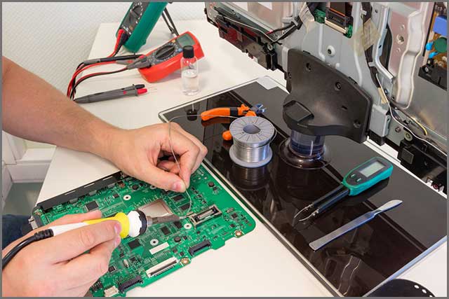 engineer soldering electronic components.jpg