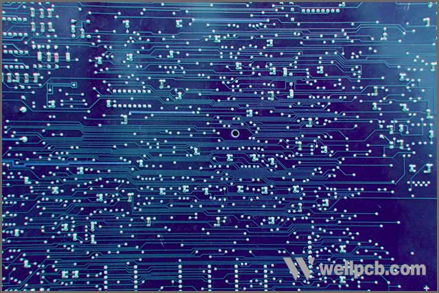 Background blue printed circuit board is a board made of a dielectric.jpg