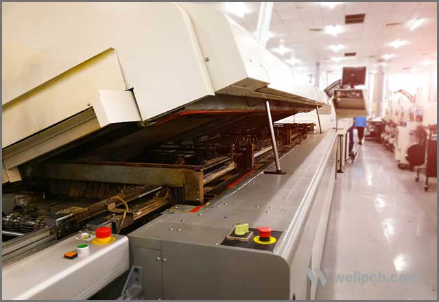 Reflow oven open for cleaning and maintenance.jpg