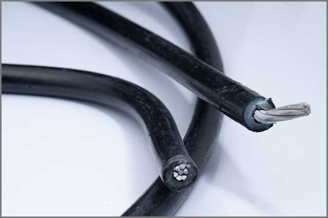 Traditional round cables with unnecessary insulation materials.jpg