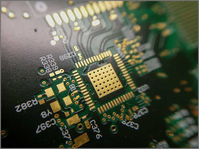 Macro close up of printed circuit board QFN quad flat no leads technology footprint.jpg