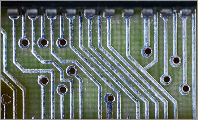 Traces of a printed circuit board closeup.jpg