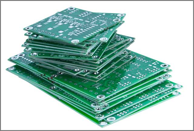 Heap of PCBs isolated on white.jpg
