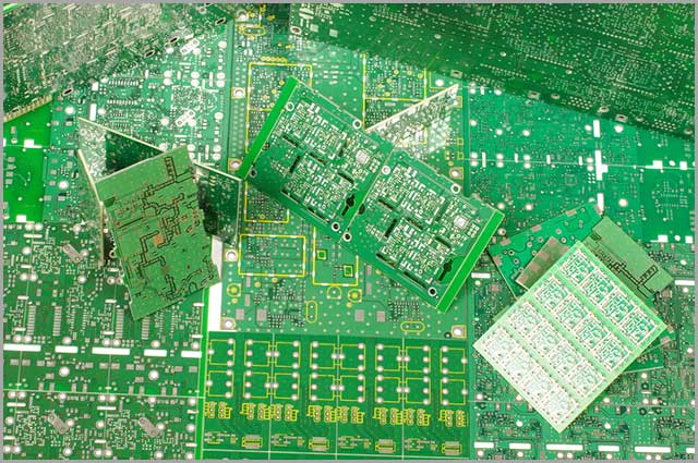 a top view of several soldered rigid PCBs.jpg