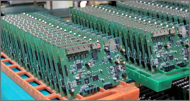 Printed circuit boards in a factory.jpg