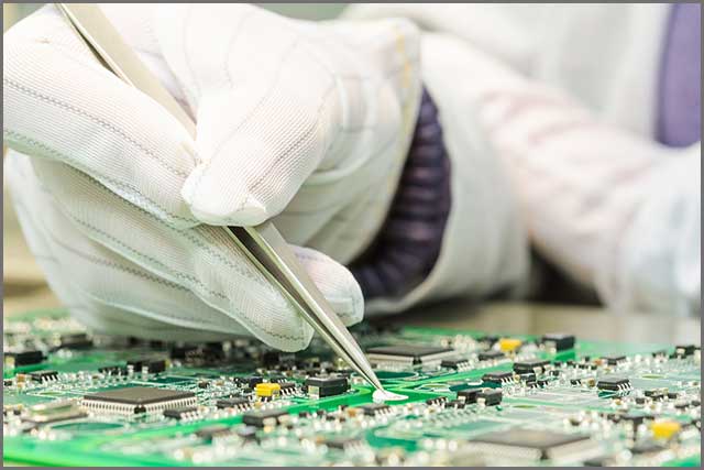 Engineering and electronic component quality control in QC lab on computer PCB turnkey manufacturing.jpg