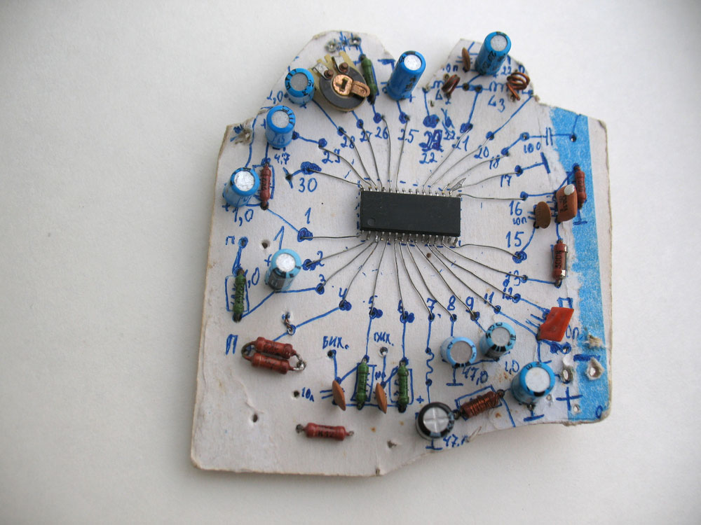 Flexible resistor and capacitors on a cardboard