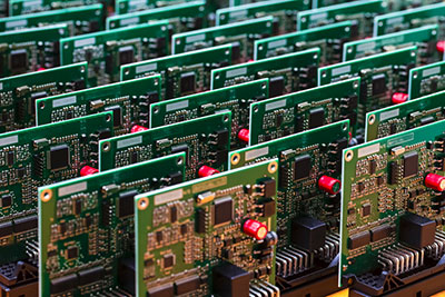 Close-up Shoot of Automotive Printed Circuit Boards with Soldered SMD or Surface Mounted Components