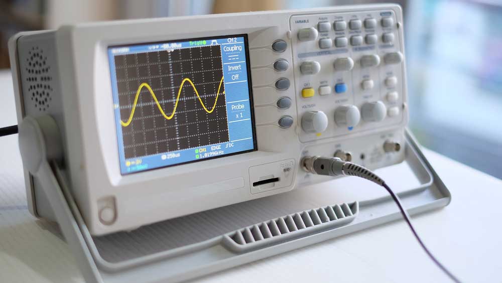A sine wave on an oscilloscope display